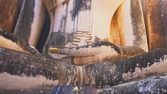 Phra Ajana Big Buddha Statue At Wat Si Chum, Sukhothai Historical Park.
A World Heritage Site is a landmark or area with legal protection by an international convention administered by the UNESCO.