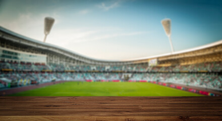 Stadium table background. Wooden table with blurred sports stadium background