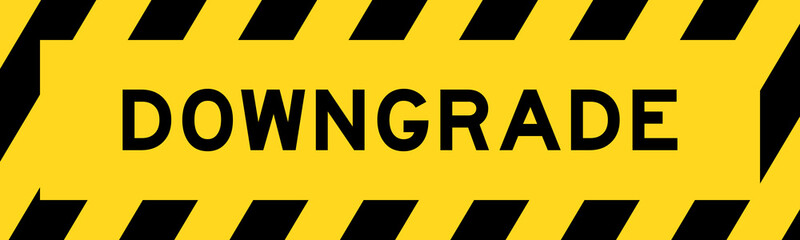 Yellow and black color with line striped label banner with word downgrade