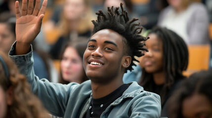 Smiling student raises hand in class during a lesson