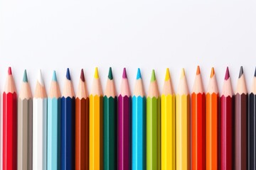 Colorful pencils arranged in row
