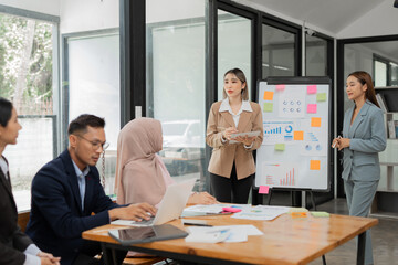 Asia business meeting   consultations of business people in the company's meeting room. 