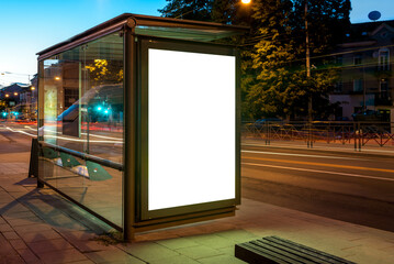 Mockup Of Bus Stop Advertising Billboard In City Street At Night. Poster Light Box With Car Light...