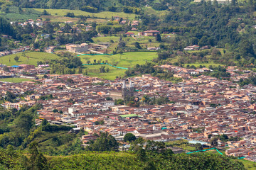 Fototapeta premium Cityscape of Jardin, Jardín, Antioquia, Colombia. Awesome landscape with the green Andes Mountains.