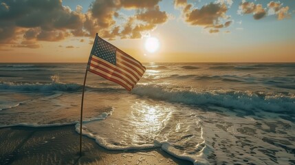 Serene beach at sunrise with the american flag fluttering proudly, casting a golden glow on the waves and shore