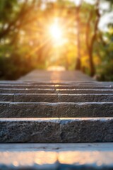 A picturesque pathway of stone steps leading into a sunlit forest, showcasing a warm and inviting atmosphere