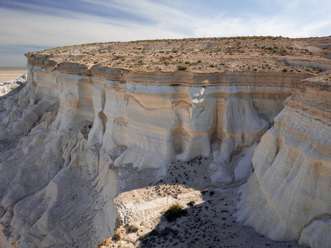 The steep limestone and chalk shores of Sor Tuzbair. Mangystau Province, western Kazakhstan.