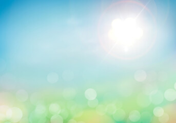 A fresh, bright but warm spring and summer blue sky background with sun flare to the right with...
