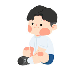 Cute student boy sitting on the floor