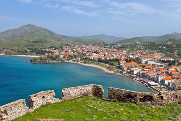 Fototapeta premium The town of Myrina, in Lemnos island, Greece, and part of the castle of the town. The local medieval castle is one the largest in the Mediterranean.