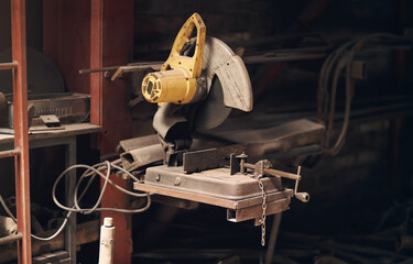 Blacksmith tools, industrial saw and manufacturing in foundry or workshop for mining, production or welding. Forge, industry and metal work with steel in factory or plant for vintage craftsmanship