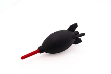Lenses and camera cleaning tool : manual air blower, isolated on white background. Photographer accessories.
