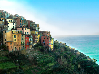 View from above of a picturesque village village perched on a rock overlooking the sea in the famous Cinque Terre in Liguria