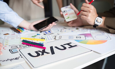 Business Team Collaborating on UXUI Design for System Development with Creative Planning and...