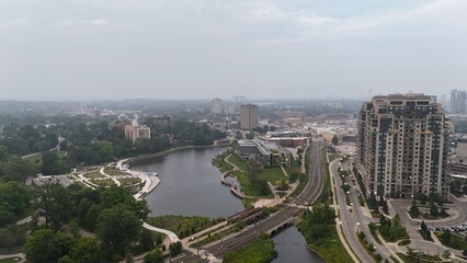 Fototapeta premium Aerial view of the Barrel Yards urban apartment complex on a cloudy day in Waterloo, Ontario, Canada