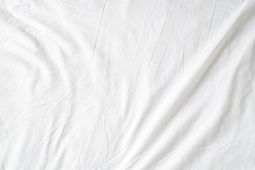 Obraz premium Abstract White Bedding Sheets or White wrinkled fabric background texture and Texture with copy-space :Creased or wrinkled white fabric,Soft focus