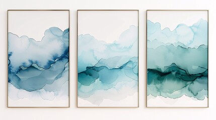 Three elegant abstract art posters with watercolor designs, mounted together on a white wall. The artwork features delicate gradients and flowing watercolor shapes in shades of blue and teal,