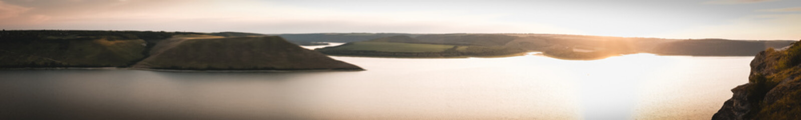 Coast of the Bakota reservoir, sunset, panorama