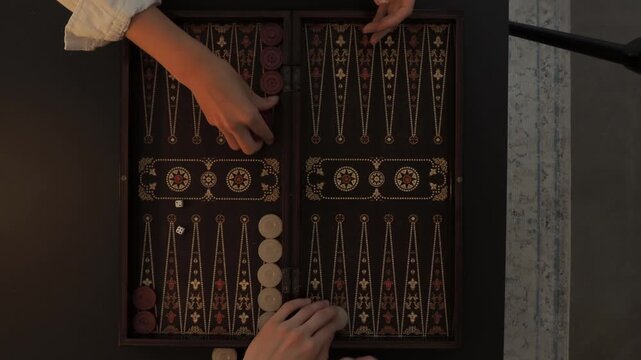 male and female hands starting position to play backgammon, 4k and 30 fps, top shot.