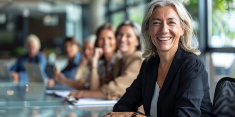 Management and senior woman in sales, marketing, and advertising strategy meetings. CEO and female entrepreneur with vision, mission, or success attitude in business office.