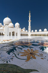 View of Grand Mosque in Abu Dhabi during sunny day.