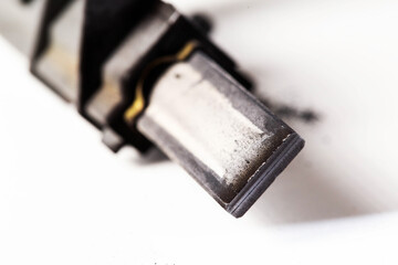 Replacing graphite electric motor brushes, close-up, industry. Copy space for text
