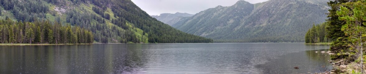 large panorama of mountains and lake in eastern Kazakhstan
