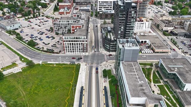 Time-lapse aerial footage of the traffic in a suburban area on a sunny day in Waterloo City, Canada