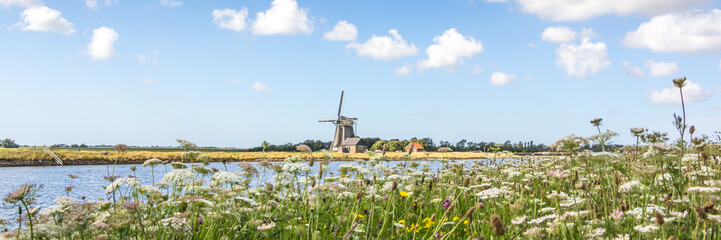 Dutch windmill Het Noorden at the wadden island Texel in the Netherlands. © Hilda Weges