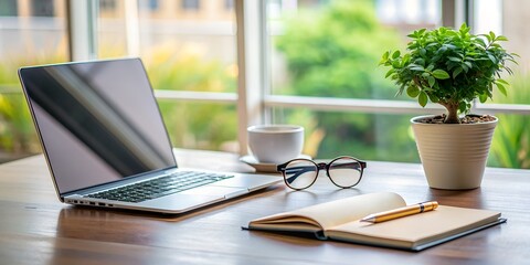 a laptop a book a ballpoint pen glasses and a plant on the desk AI Generative