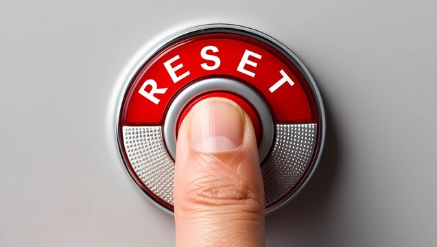 Finger Pressing Reset Button
