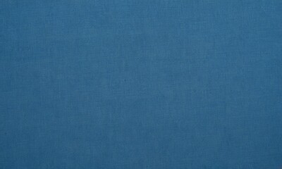 Fototapeta premium close-up of a solid blue fabric or material.