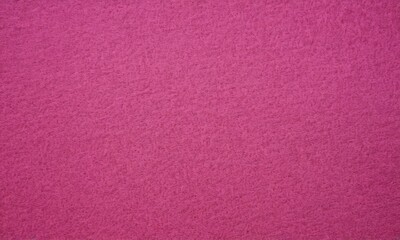 Fototapeta premium close-up of a solid, bright pink fabric.