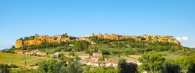 Obraz premium Orvieto, Italy. Afternoon view of Orvieto and its historic center. The Countryside surround the old Etruscan city in the province of Terni, Umbria. Banner header image.