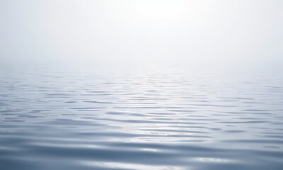Obraz premium blurred photograph of a body of water with ripples, and the sun is shining brightly in the background.