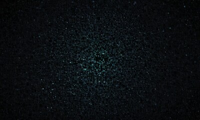 Obraz premium photograph of a black background with a small, bright green object in the center.