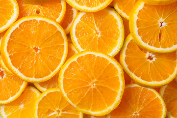 top view of ripe juicy orange slices on background with copy space