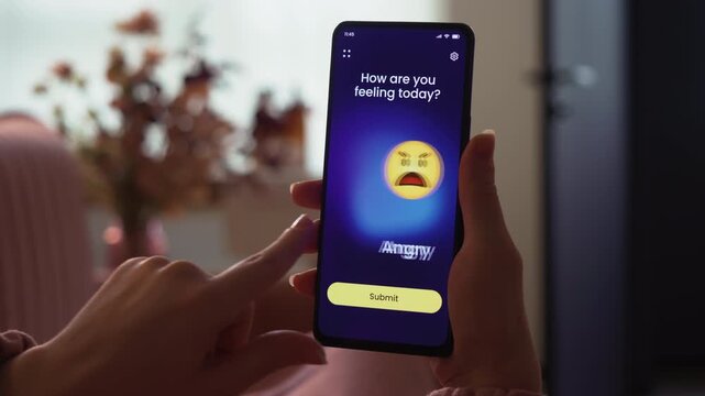 Tracking emotions on a mental health app. Choosing a happy emoticon and submitting it to a digital journal. Fictional Interface.