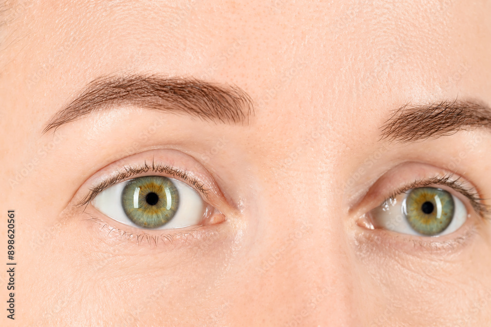 Poster woman with beautiful green eyes, closeup view