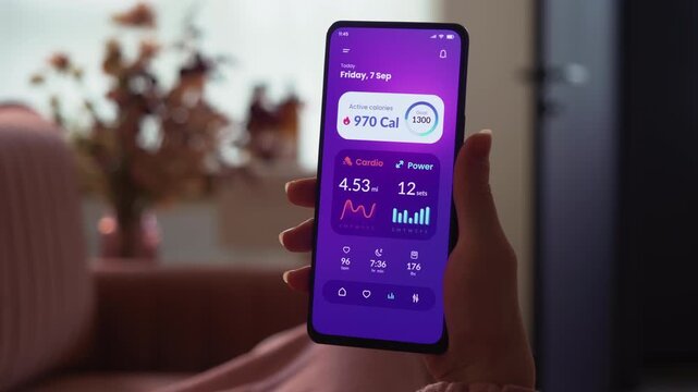 Tracking fitness activity on a smartphone. Checking workout statistics using app for mobile phone. Fictional Interface.