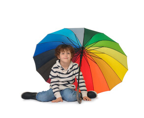 Little boy with rainbow umbrella on white background