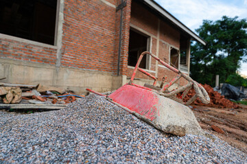 Bulk of crushed rock or pebble rock, material for house building, that placed on the construction...