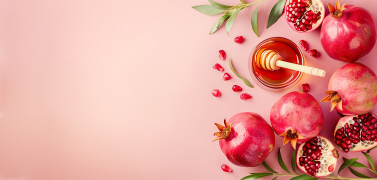 Rosh hashanah, jewish new year holiday, background with pomegranate and honey, traditional food for celebration 