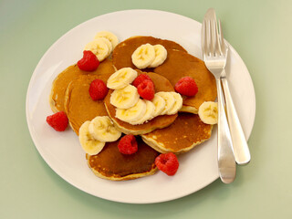 Pancakes with banana and raspberry
