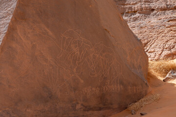 rock painting in desert, Bouhadian rocks in Tadrart Rouge, Tassili N'Ajjer National Park. Sahara
