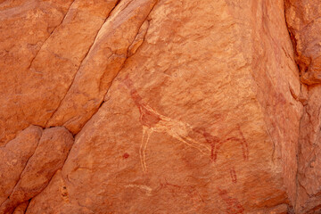 rock painting in desert, Bouhadian rocks in Tadrart Rouge, Tassili N'Ajjer National Park. Sahara