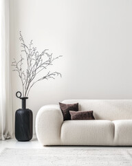 Minimalist living room are with natural lighting, neutral colors and minimal furniture. Residential interiors design composition with copy space.