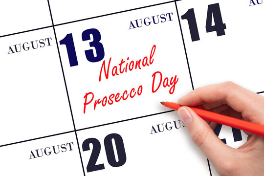 August 13. Hand writing text National Prosecco Day on calendar date. Save the date.