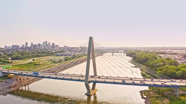 Bond Bridge and Kansas City skyline with camera rotation. The Christopher S. Bond Bridge in Kansas City, Missouri (aka New Paseo Bridge) is a cable-stayed bridge across the Missouri River.