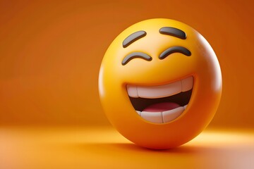 Fototapeta premium Bright yellow laughing emoji with a wide smile and closed eyes against an orange background.